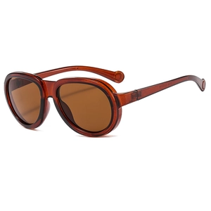 Retro amber aviator sunglasses with transparent brown frame and high UV protection