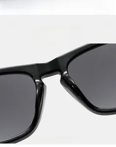 Detail of premium lightweight sunglasses bridge showing elastic black square frame material