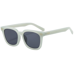 Modern square mint green sunglasses with dark grey lenses and gold rivet accents