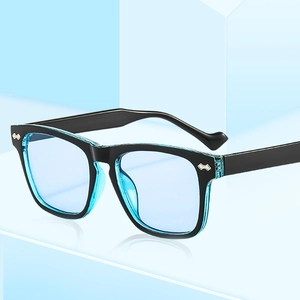 Fashion rectangular sunglasses with black-blue frames and silver rivets on a blue stand