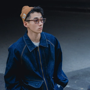 Deep blue denim zip jacket with stand collar and retro streetwear silhouette