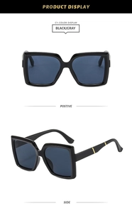 Front and side views of large square black frame sunglasses with golden accents