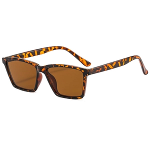 Retro rectangular tortoiseshell sunglasses with brown lenses in a 3/4 side view angle