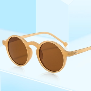 Retro round amber sunglasses with dark brown lenses and minimalist frame design