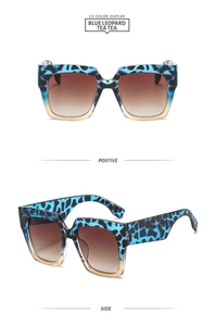Détails de la monture léopard bleu et des verres dégradés thé de ces lunettes de soleil