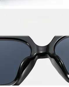 Detail of high quality lightweight black frame sunglasses with smooth nose bridge bridge