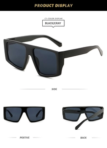 Detailed views of chunky square oversized sunglasses with black frames and gray lenses