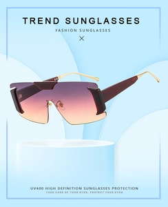 Detail of UV400 oversized gradient shield sunglasses with slim gold metal temples
