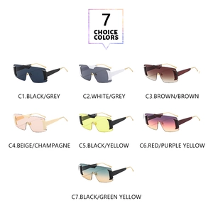 Matrix display of seven different colored rimless oversized sunglasses with metal temples