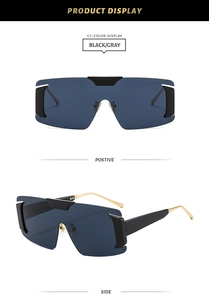 Front and side view of shield sunglasses with dark gray lenses and gold metal temples