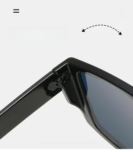 Detail of durable metal hinges on oversized square black frame sunglasses with smooth texture