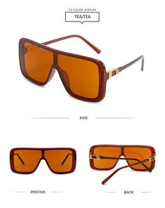 Three-angle view of oversized square sunglasses with gold accents in tea brown color