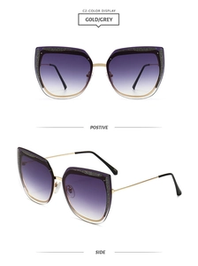 Dettaglio occhiali da sole cat-eye con glitter sulla montatura e stanghette d'oro