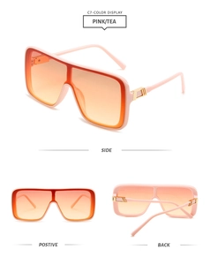 Pink one-piece sunglasses with tea gradient lenses and gold hinge detail shots
