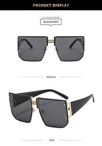 Detail view of square black sunglasses with iconic H-shaped bridge and gold accents