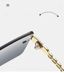 Macro shot of durable golden metal chain hinge on vintage square sunglasses