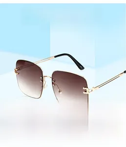 Close-up of square gradient brown lenses and gold metal temples with model 3651 detail