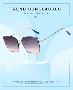 Détails des lunettes de soleil en métal avec verres dégradés roses et protection UV400