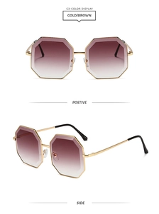 Detail view of gold octagonal sunglasses with brown and purple gradient lenses