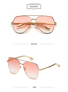 Detailed front and side views of gold aviator sunglasses with pink gradient lenses