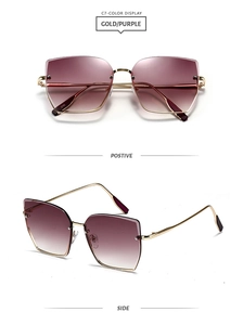 Vue détaillée de lunettes de soleil dorées avec verres dégradés violets