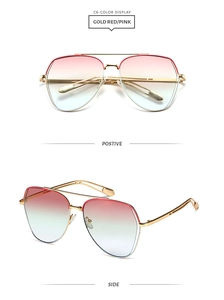 Detailed front and side view of gold metal pilot sunglasses with pink gradient lenses