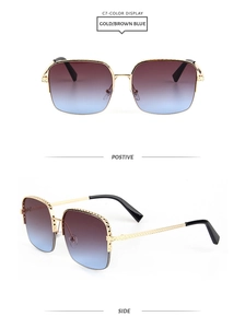 Detail of gold metal sunglasses with braided temples and brown-blue gradient lenses