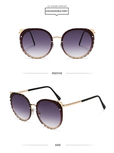 Detail of cat-eye sunglasses with gold frames and gradient lenses shown from multiple angles