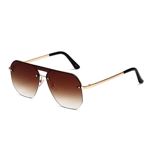 Fashionable rimless pilot sunglasses with brown gradient lenses and gold metal frame