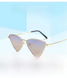Detail of triangle metal sunglasses with gradient purple lenses on a blue stand