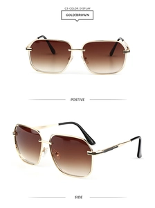 Detail view of gold metal square sunglasses with gradient brown lenses and hollow cut design