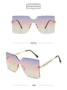 Detail of gradient oversized rimless sunglasses with rhinestone-embellished gold temples