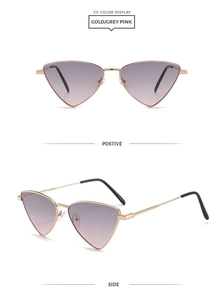 Detail view of gold triangle sunglasses with grey pink gradient lenses and black tips