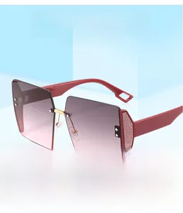 Macro view of gradient square lenses and red glitter arms on stylish metal sunglasses