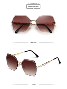 Front and side views of rimless gradient brown sunglasses with rhinestone wave temples