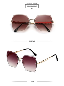 Close-up of rimless rhinestone sunglasses featuring gold-purple gradient lenses
