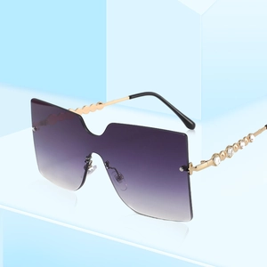 Oversized rimless shield sunglasses with purple gradient lenses and rhinestone temples