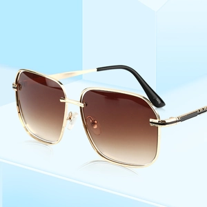 Fashionable oversized square metal sunglasses with brown gradient lenses and gold frames