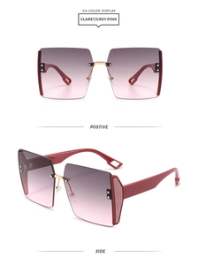 Detail view of oversized rimless sunglasses with grey-pink gradient lenses and claret temples