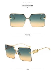 Detail view of square semi-rimless sunglasses with gold metal frame and gradient lenses