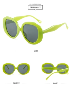 Three-way view of green diamond-shaped fashion sunglasses with grey lenses and wavy frame