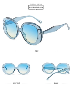 Three perspectives of trendy oversized blue frame sunglasses with gradient lenses