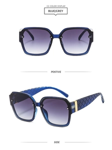 Detail of square sunglasses with blue gradient lenses and woven texture on the temples