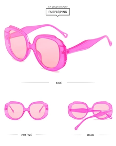 Three-angle view of oversized pink transparent sunglasses with thick oval frames