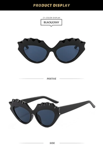 Black wavy frame cat-eye sunglasses with dark gray lenses shown in front and side views