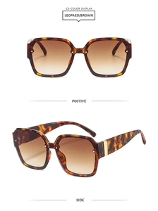 Detail view of leopard print sunglasses with quilted texture temples and brown lenses