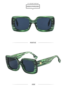 Detail view of retro square striped sunglasses with green stripes and gold metal accents