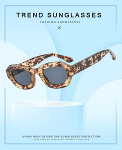 Detail of tortoise frame sunglasses with UV400 protection and dark grey lenses