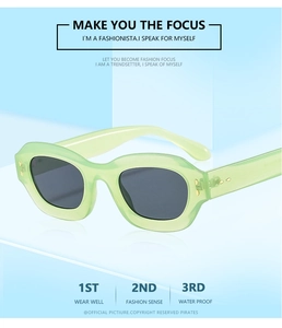 Close-up of retro oval lime green sunglasses with dark lenses on a blue background