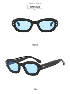 Front and side views of vintage oval sunglasses with black frames and light blue lenses